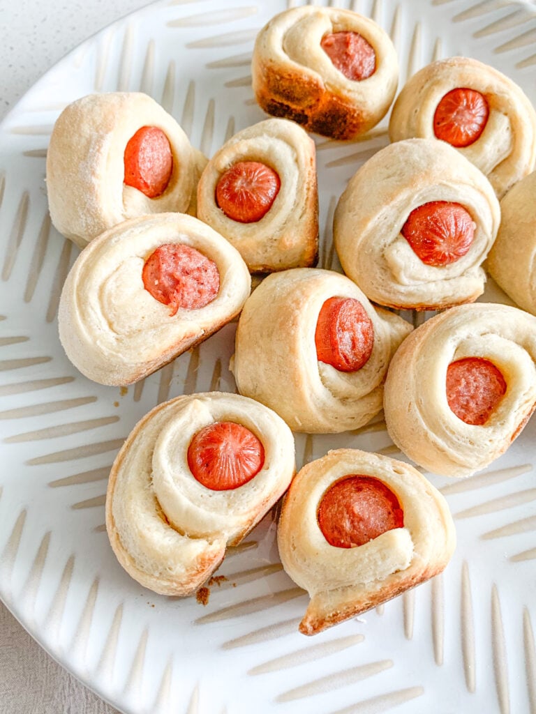freshly baked mini sourdough pigs in a blanket