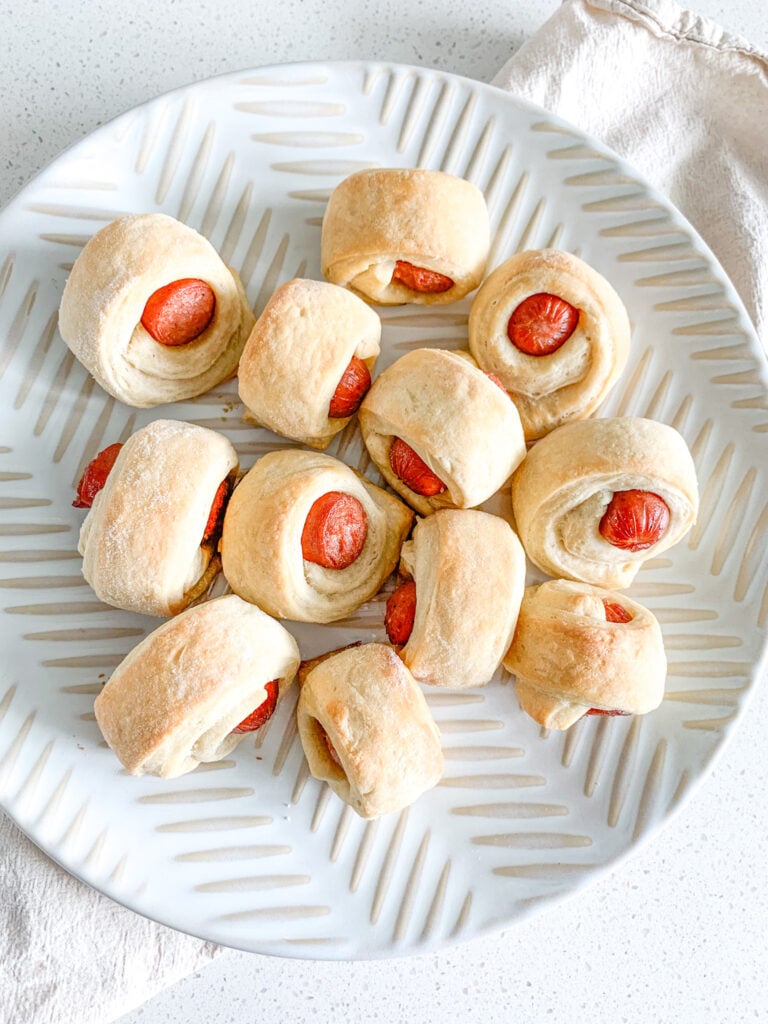 freshly baked mini sourdough pigs in a blanket