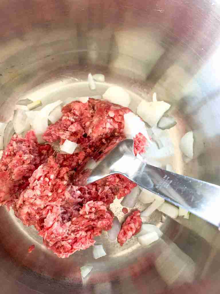 browning ground beef and onions for game day chili