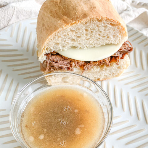 freshly cooked slow cooker french dip sandwich