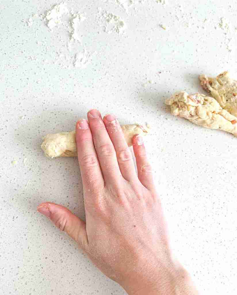 rolling excess maple bacon biscuit dough