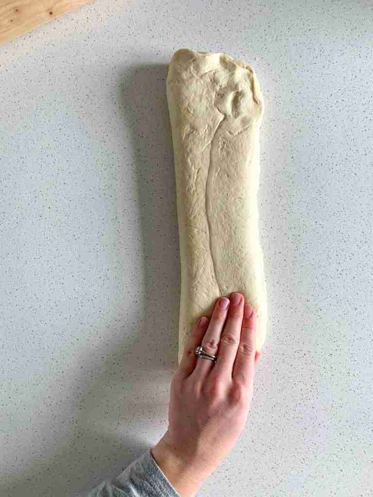 shaping sourdough parker house roll dough