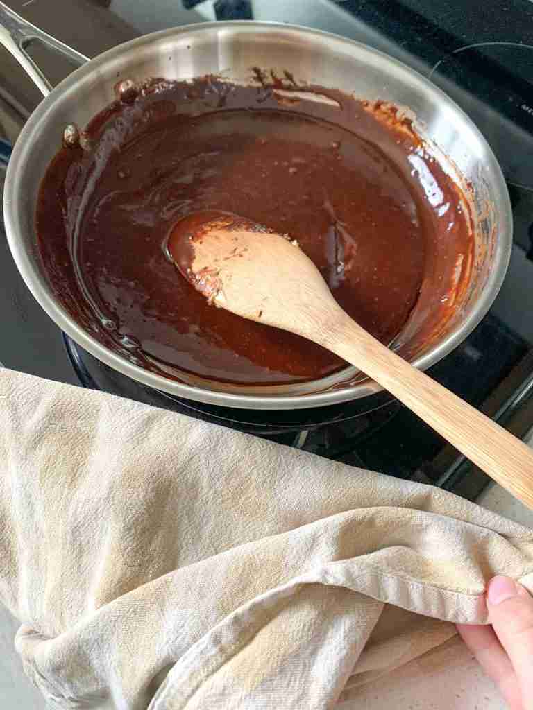 chocolate filling being made in a pan for sourdough chocolate babka