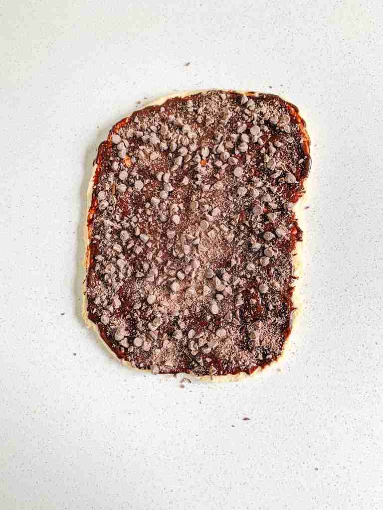 sourdough chocolate babka dough rolled out and filled