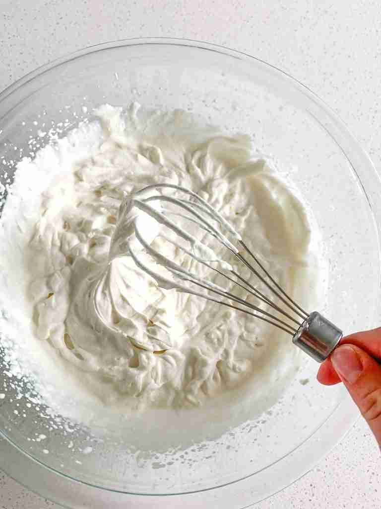 freshly made whipped cream frosting