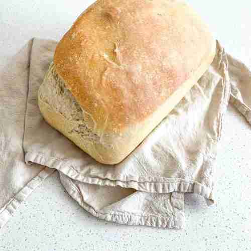 freshly baked sourdough loaf for beginners