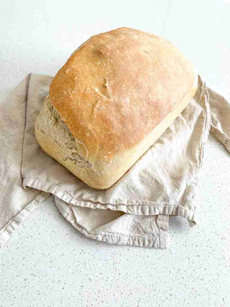 freshly baked sourdough loaf for beginners