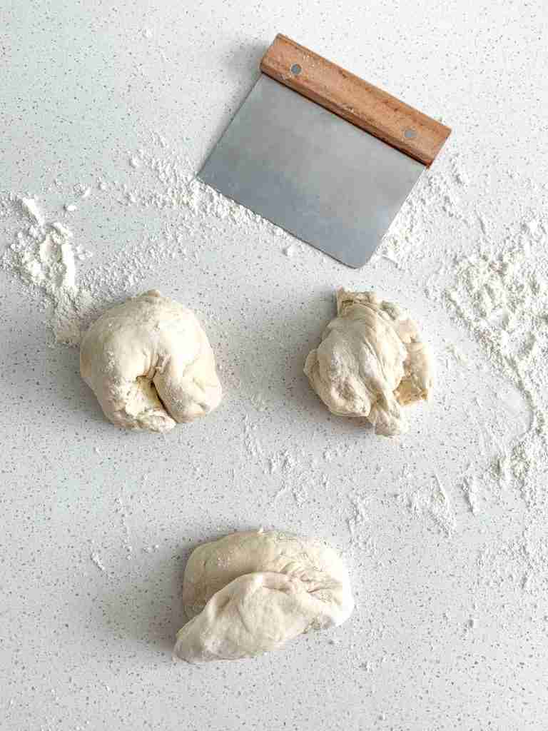 calzone dough cut into 3 pieces