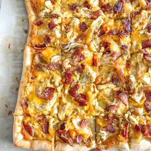 freshly baked and cut alabama white bbq chicken bacon pizza
