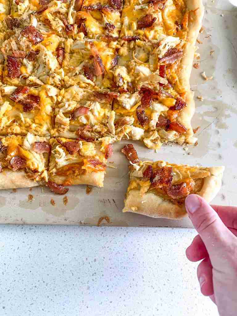 freshly baked and cut alabama white bbq chicken bacon pizza