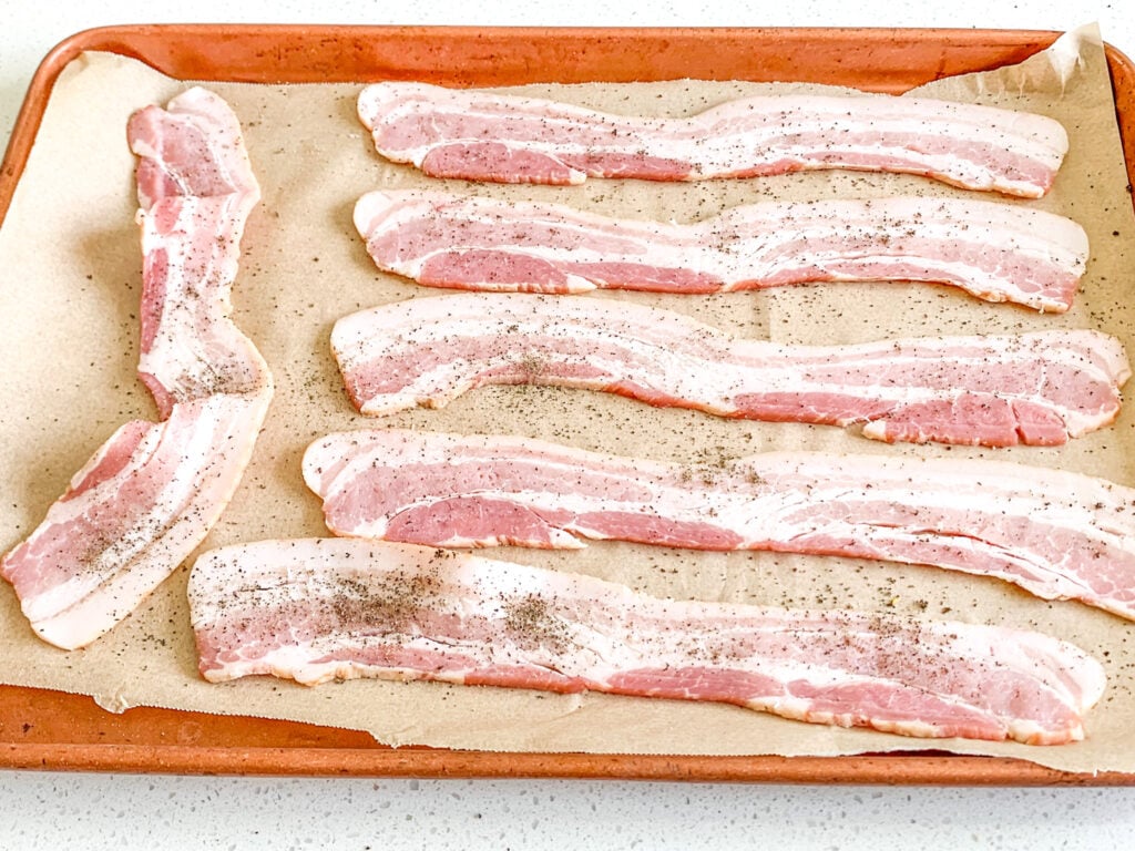 bacon seasoned and ready to be baked