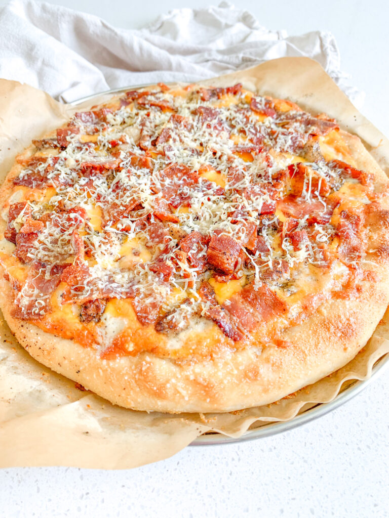 freshly baked sourdough Alabama white BBQ chicken bacon pizza