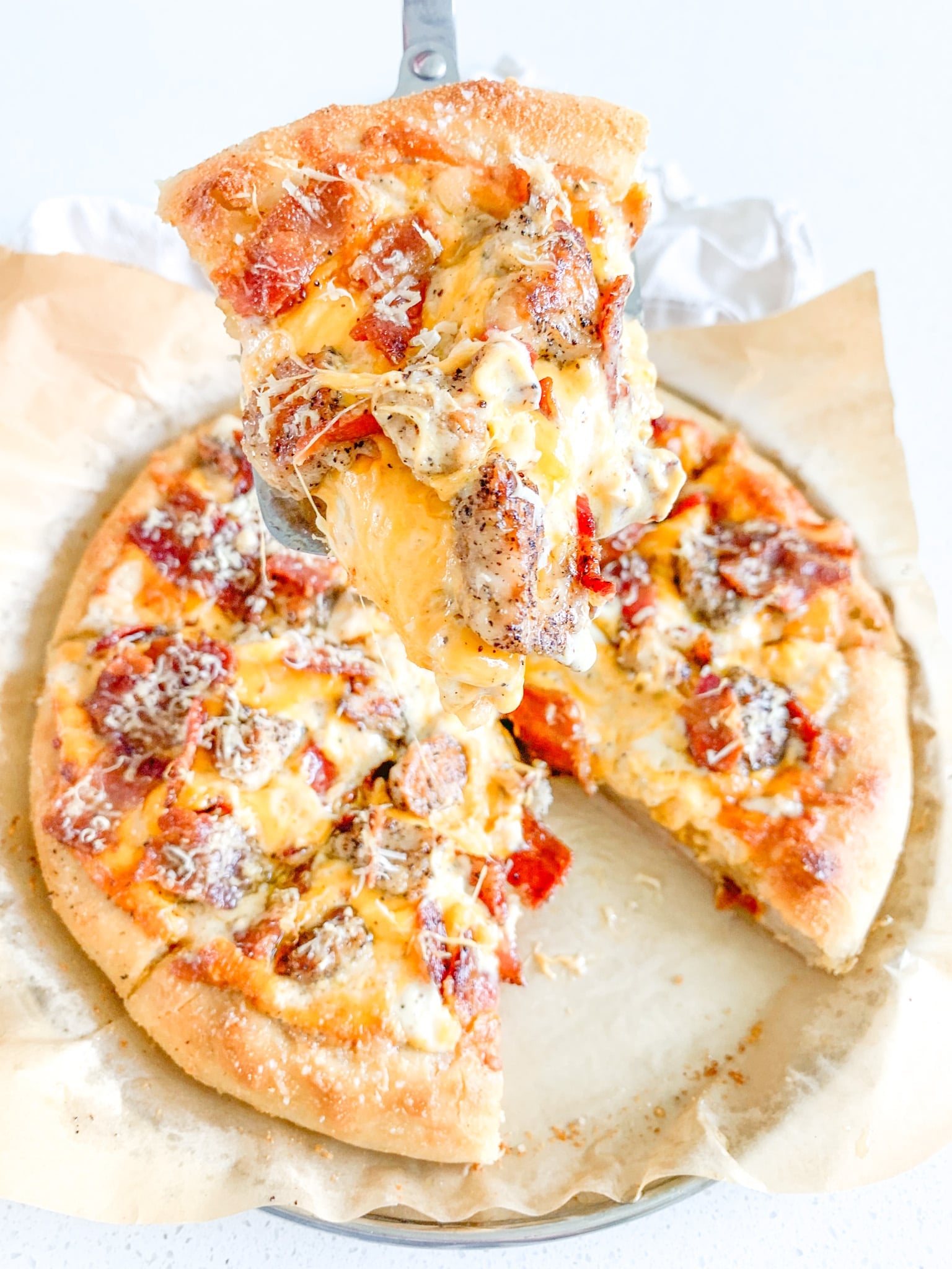 freshly baked sourdough Alabama white BBQ chicken bacon pizza