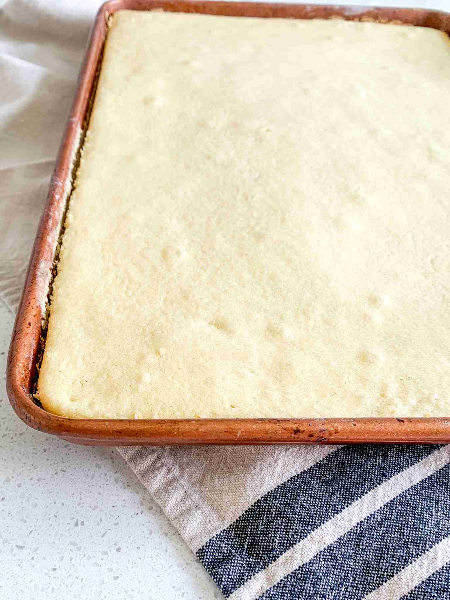 sourdough vanilla half sheet cake freshly baked