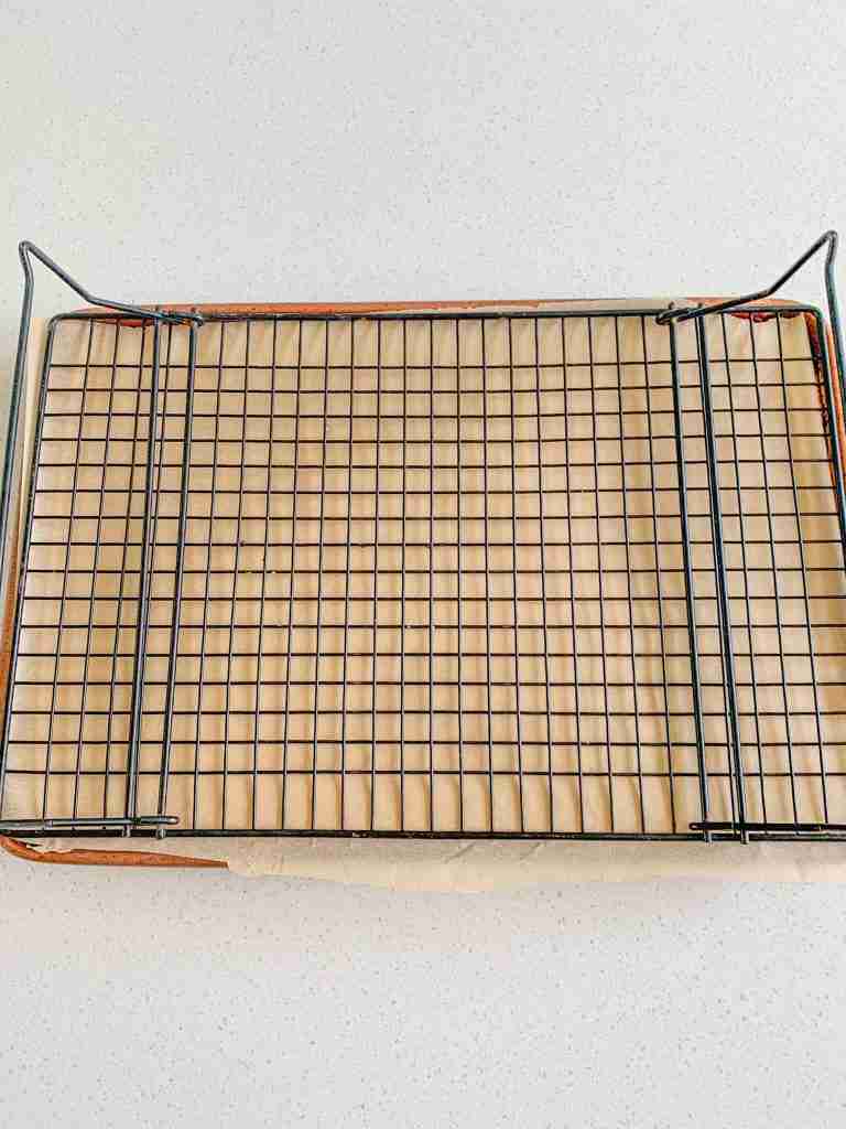 wire rack on top of cake ready to flip