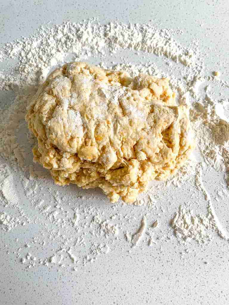 sourdough orange scone dough combined and on a lightly floured counter