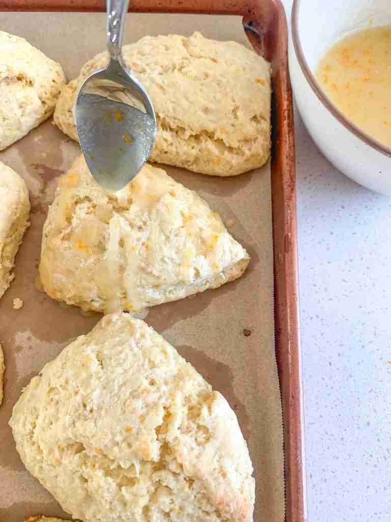 drizzling sourdough orange scones with orange glaze
