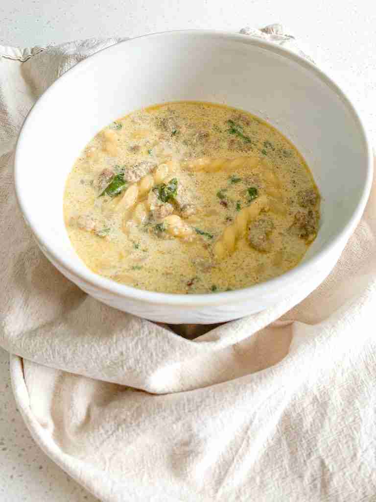freshly cooked Creamy Parmesan Italian Sausage Soup in a bowl