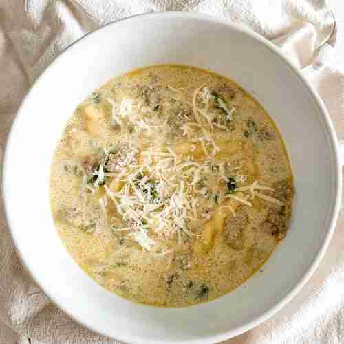 freshly cooked Creamy Parmesan Italian Sausage Soup in a bowl