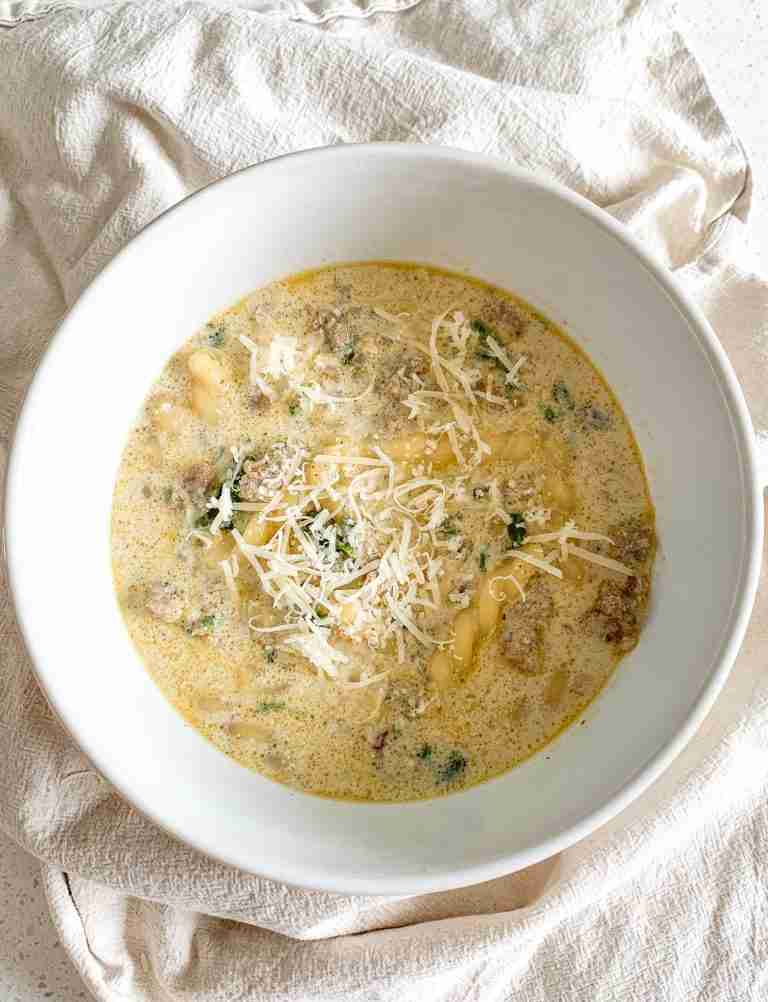 freshly cooked Creamy Parmesan Italian Sausage Soup in a bowl