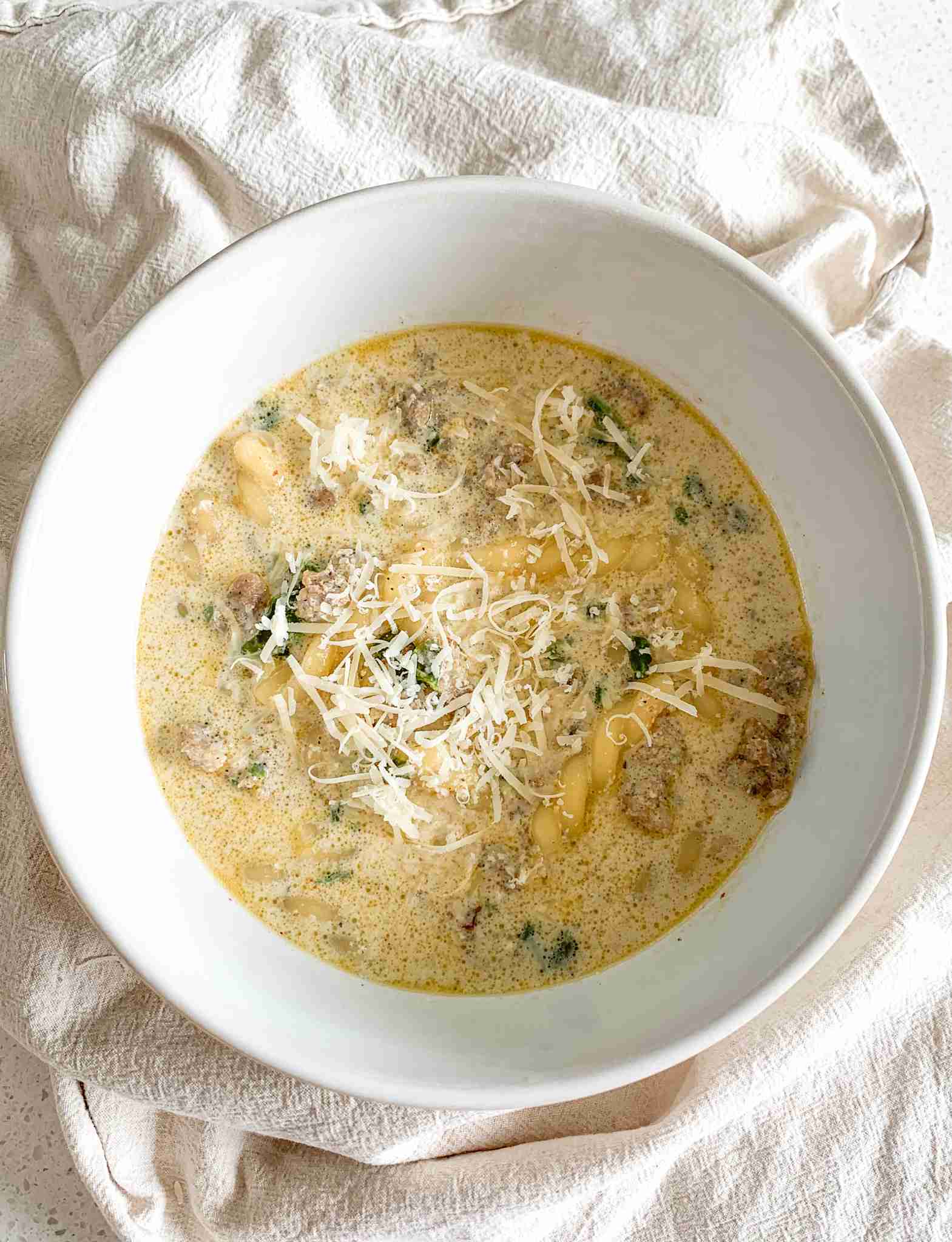 freshly cooked Creamy Parmesan Italian Sausage Soup in a bowl