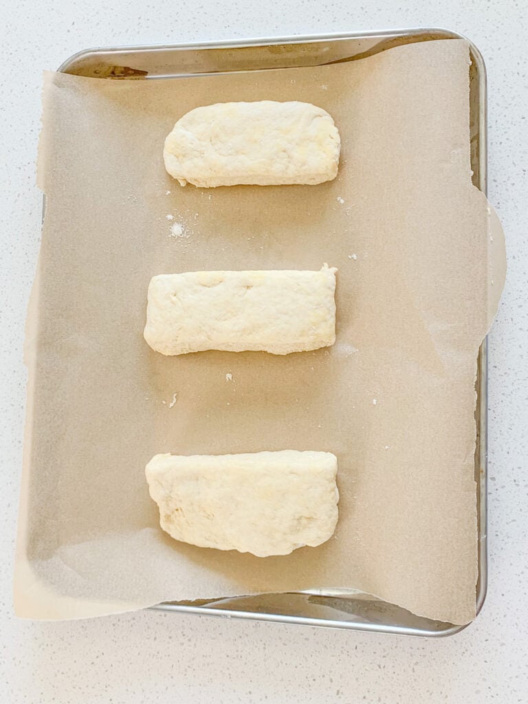 sliced sourdough buttermilk biscuits ready to be baked