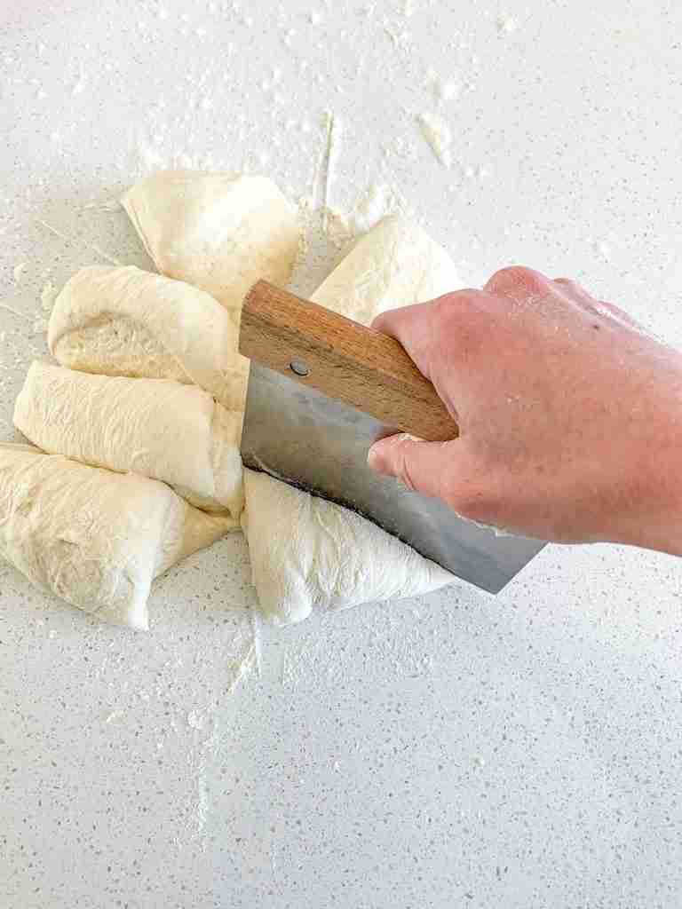 dividing sourdough garlic pull apart bread dough