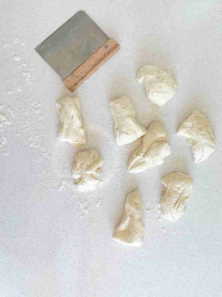 dividing sourdough soft pretzel dough