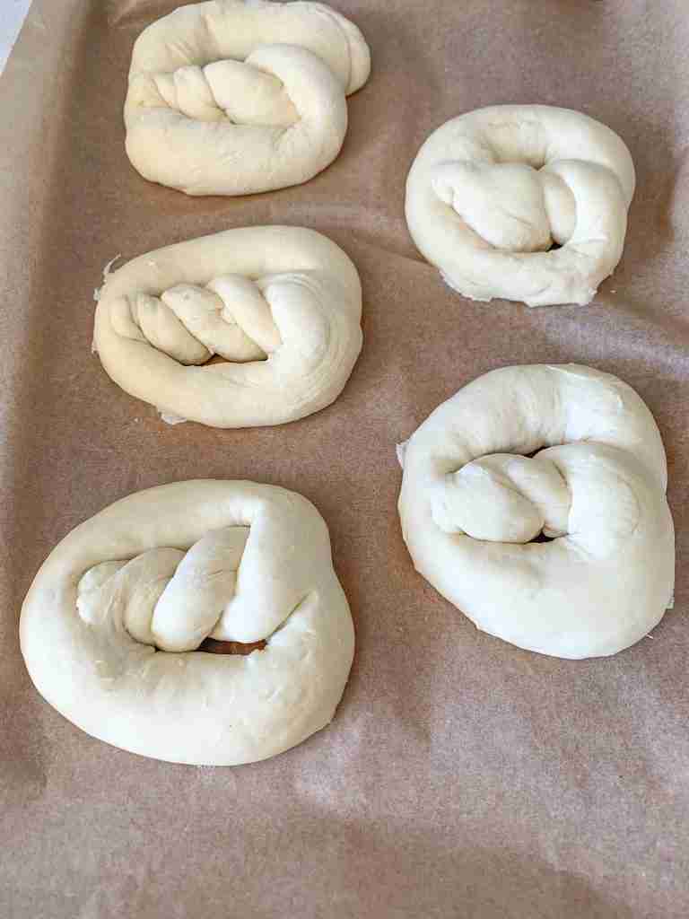 soft sourdough pretzels rising after shaping