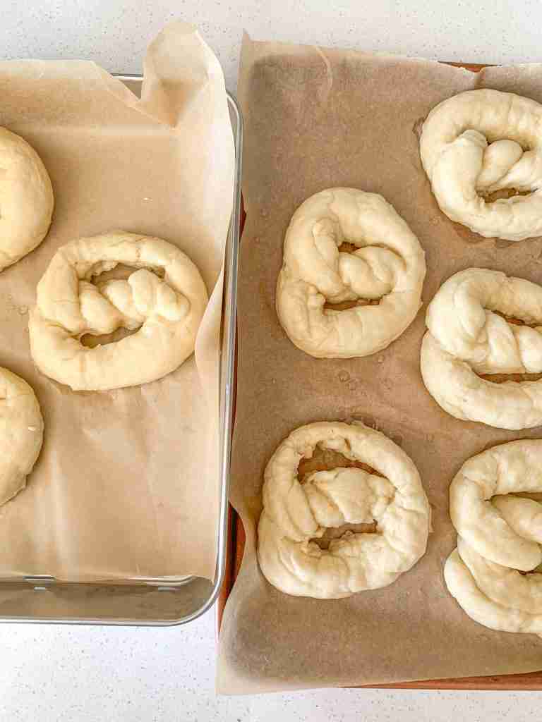 boiled soft sourdough pretzels ready for baking