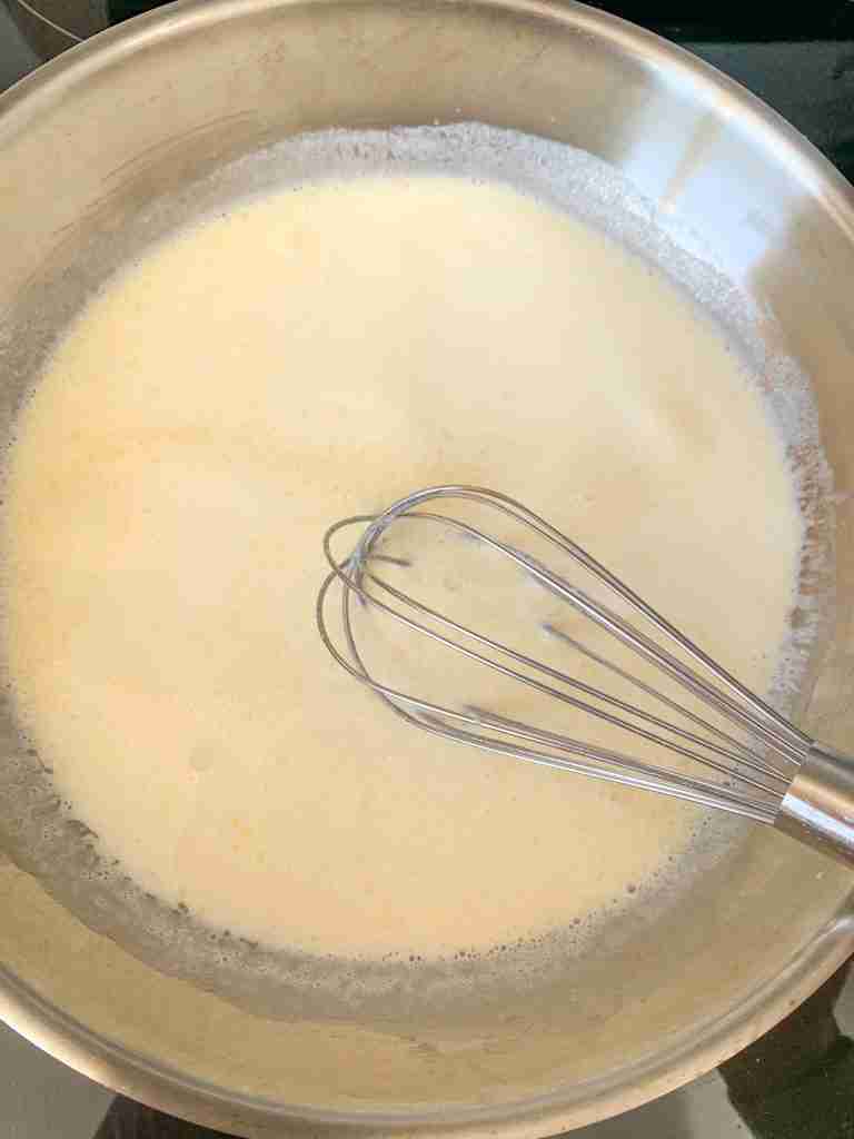 milk and salt added to the roux to make jalapeno cheese dip