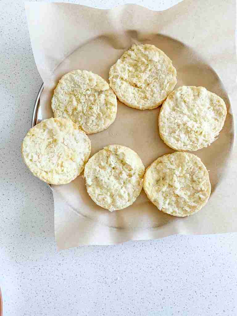 biscuits cut open ready to fill for sourdough breakfast sandwiches
