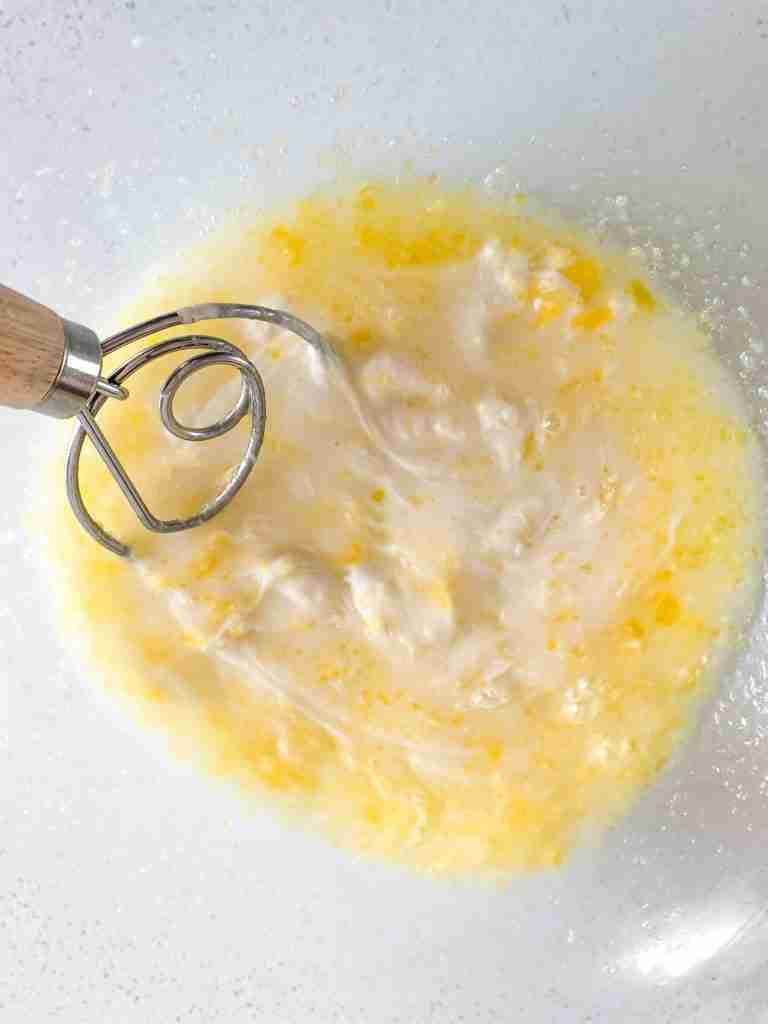 mixing wet ingredients for sourdough pita bread
