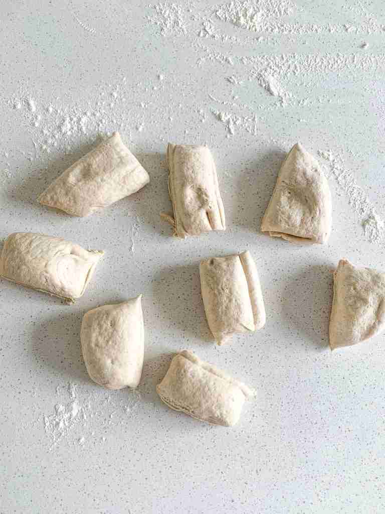 sourdough pita bread dough cut into pieces