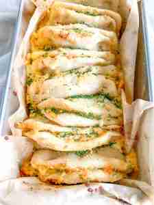 freshly baked cheesy sourdough garlic pull apart bread