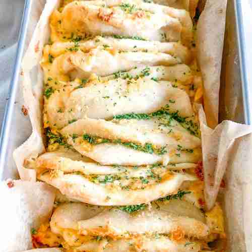 freshly baked cheesy sourdough garlic pull apart bread