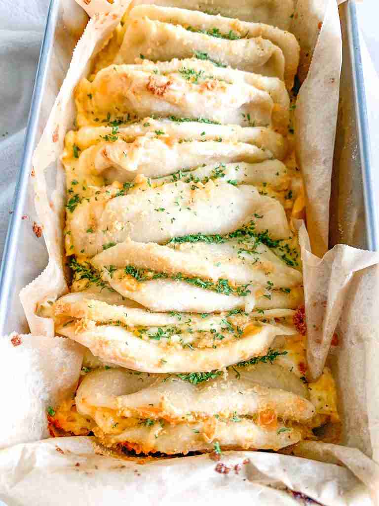 freshly baked cheesy sourdough garlic pull apart bread