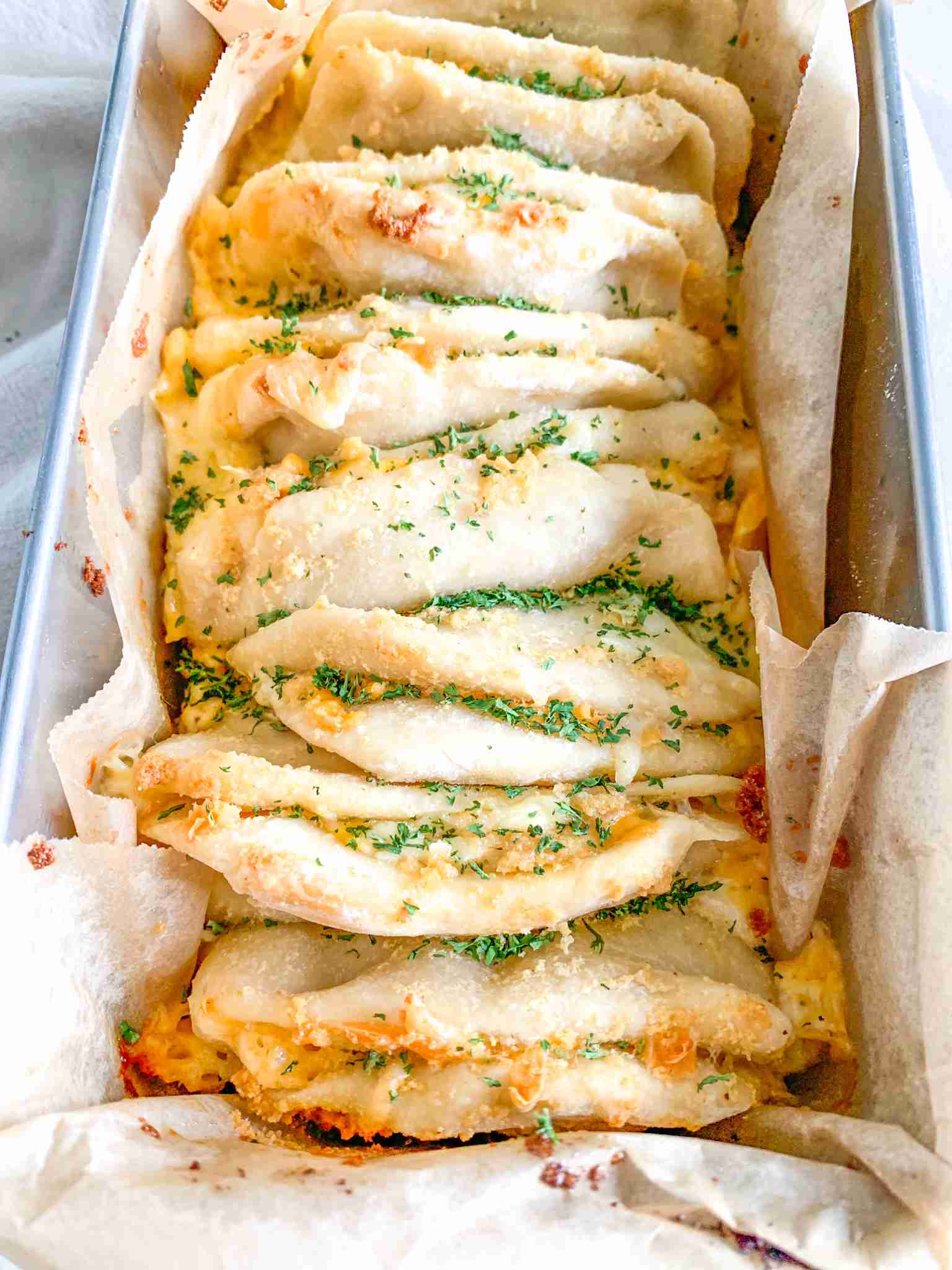 freshly baked cheesy sourdough garlic pull apart bread
