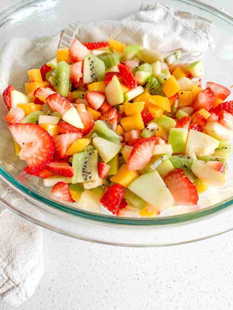 freshly made spring fruit salad in a bowl