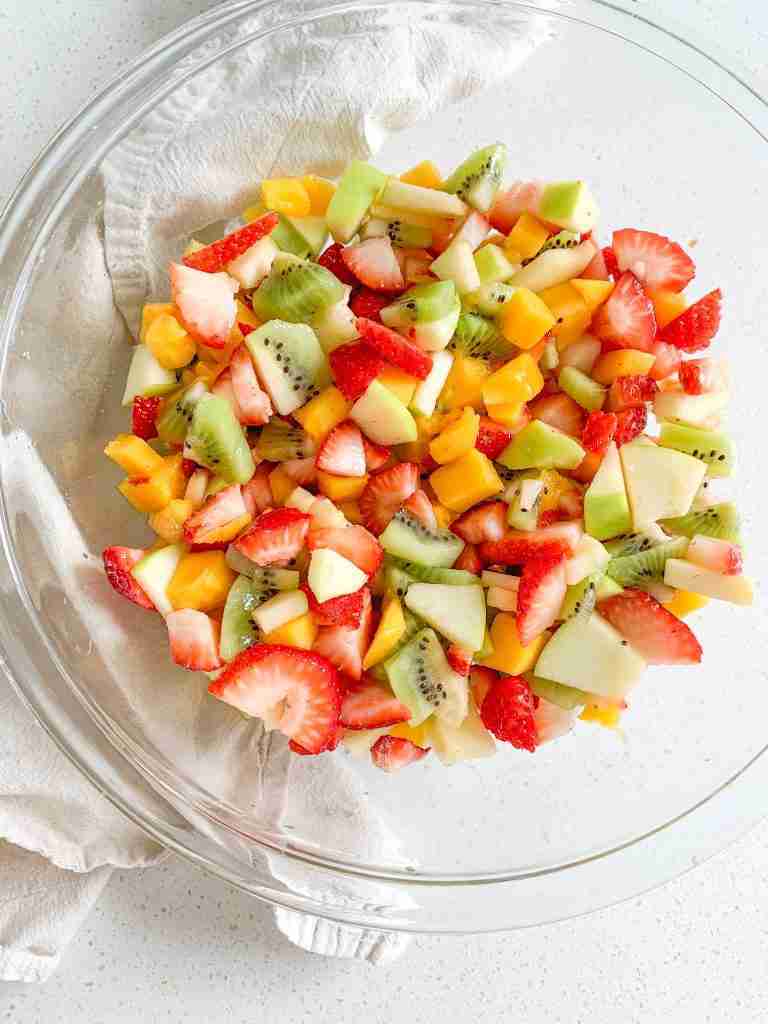 freshly made spring fruit salad in a bowl