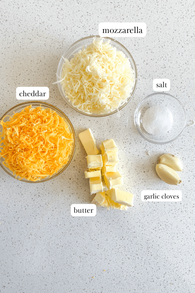 labeled ingredients for cheesy sourdough garlic pull apart bread