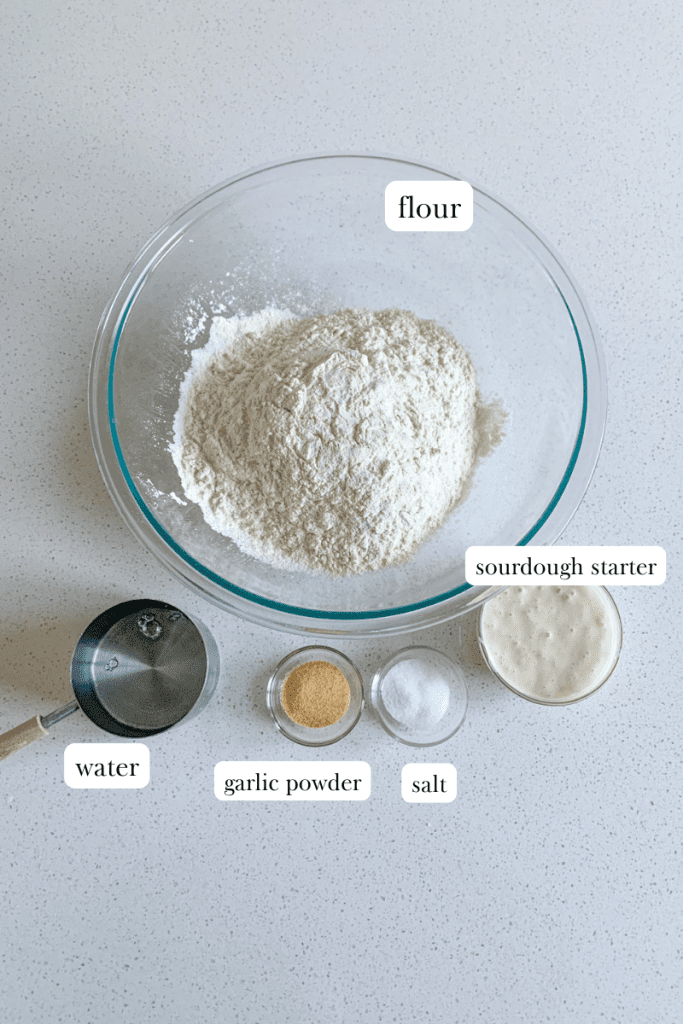 labeled ingredients for cheesy sourdough garlic pull apart bread