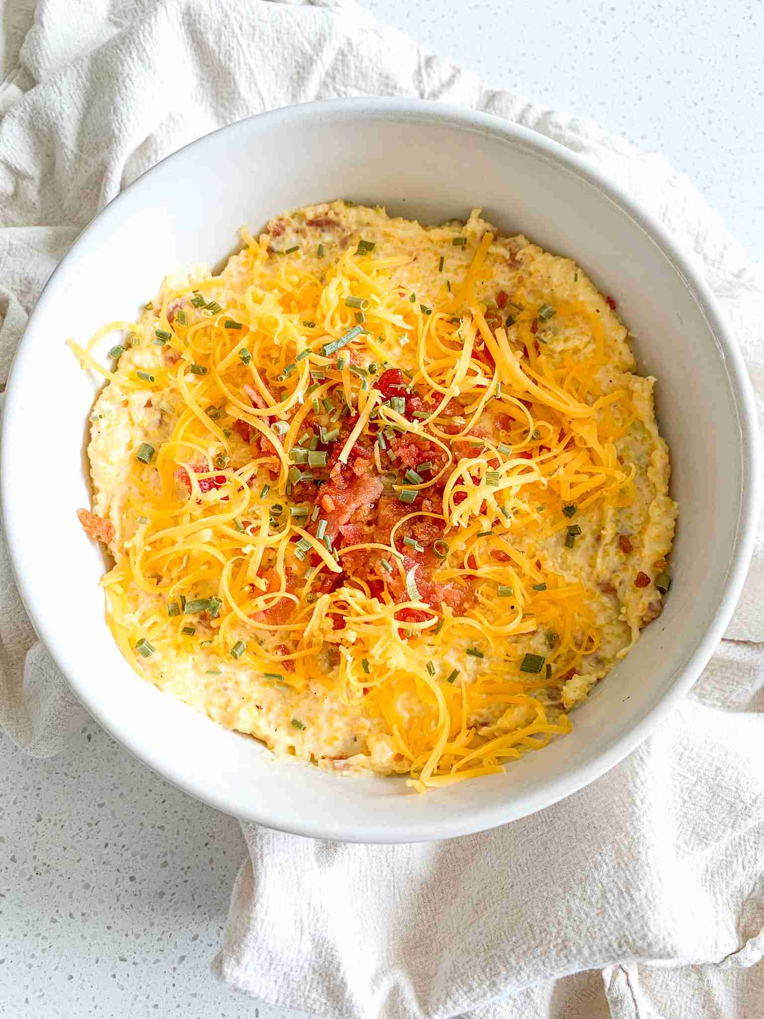 freshly made bowl of bacon cheese grits