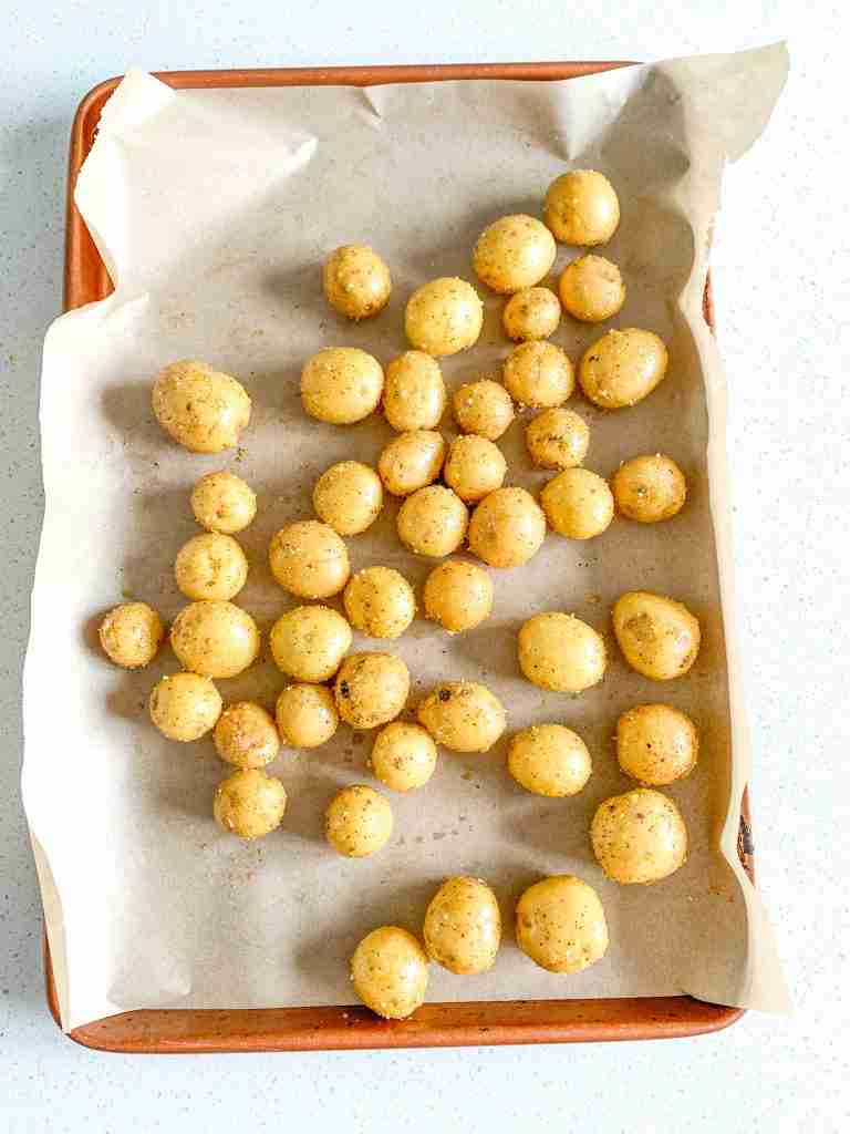 seasoned baby potatoes ready for the oven for lemon potatoes recipe
