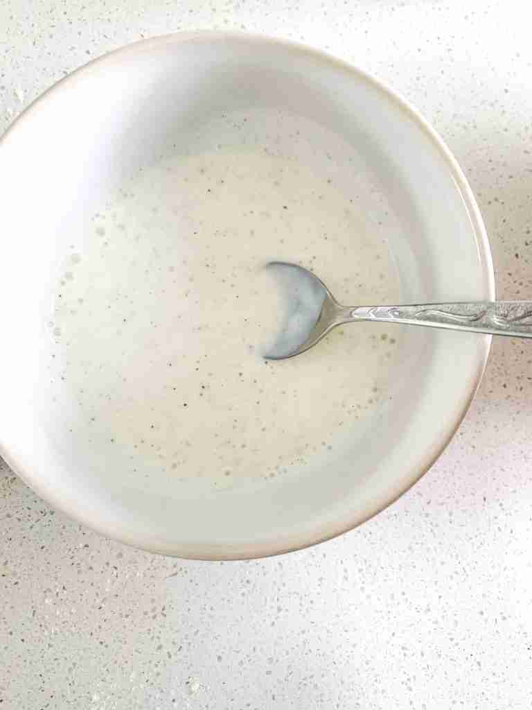 mixing buttermilk mixture for Buttermilk Fried Chicken Tenders