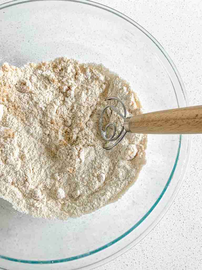 mixing dry ingredients for sourdough chocolate chip walnut scones