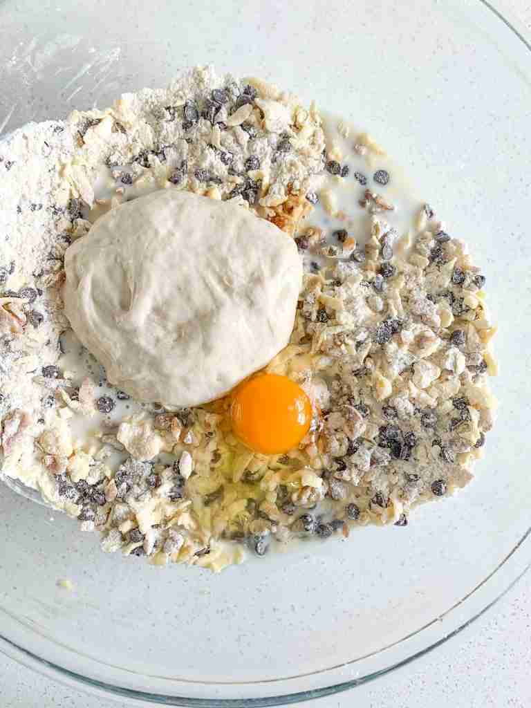 mixing wet ingredients for sourdough chocolate chip walnut scones