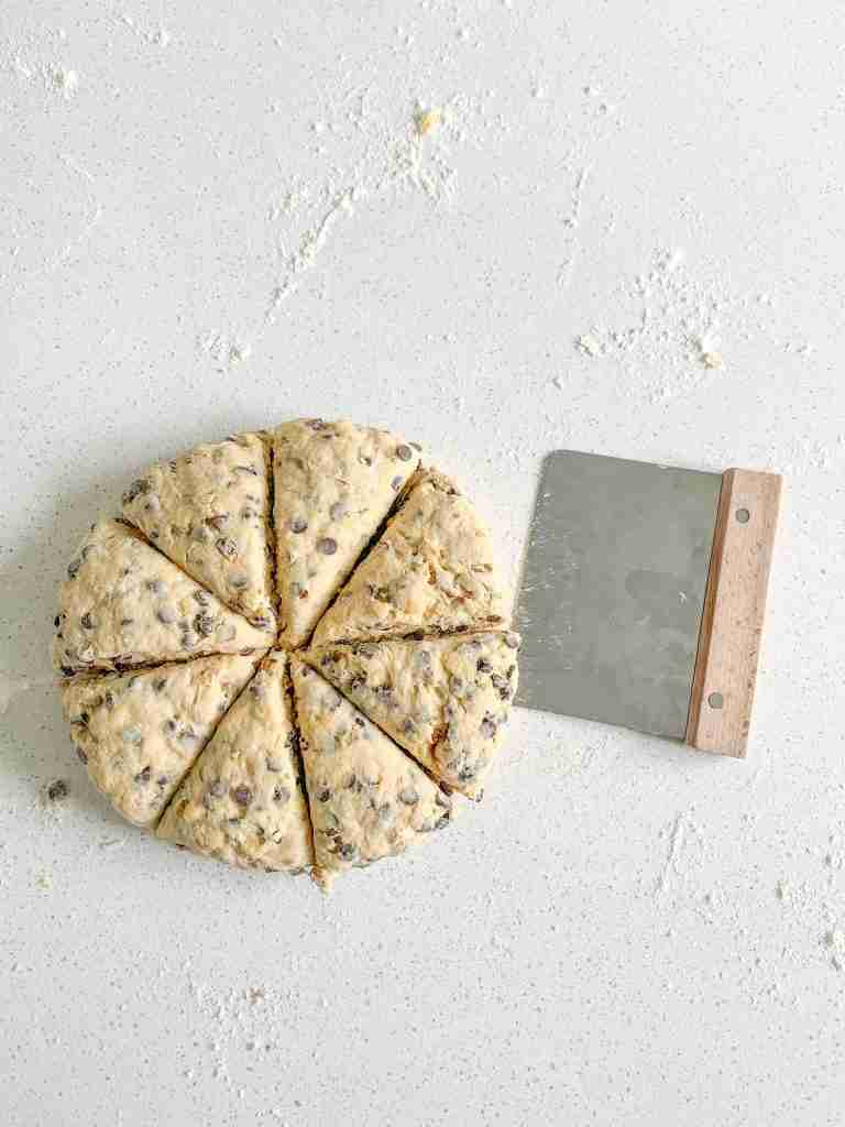 cutting sourdough chocolate chip walnut scones