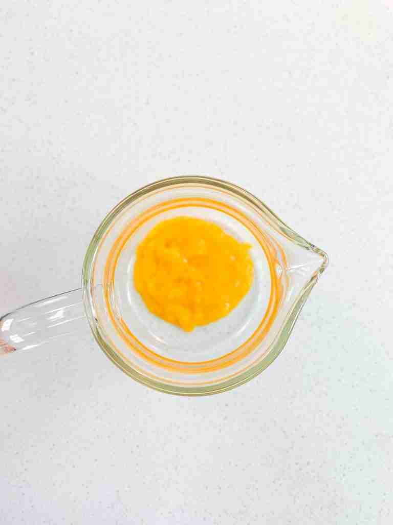 mango puree in a pitcher for mint julep punch