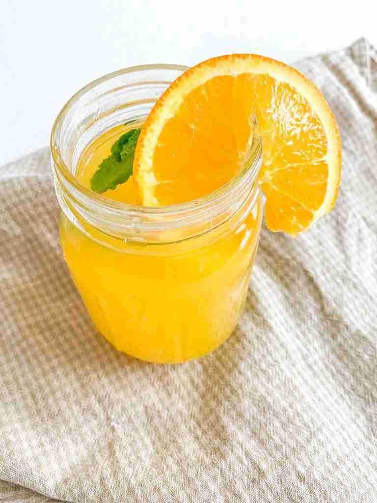 freshly made mint julep punch in a glass